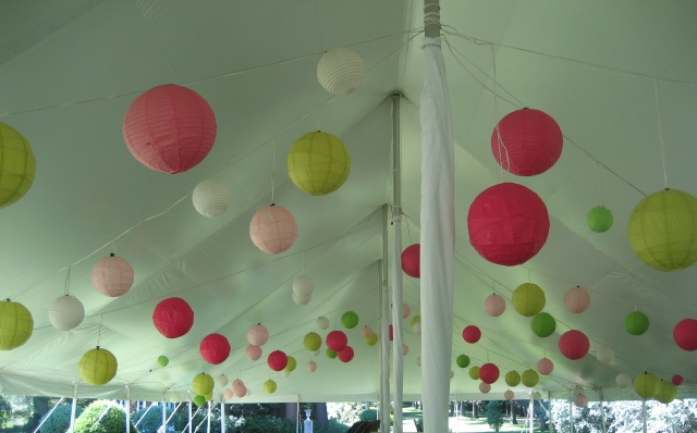 White Pole Tent with Multi-Colored Paper Lanterns