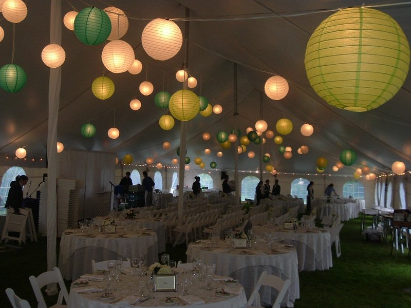 Multi Colored Paper Lanterns in a White Pole Tent