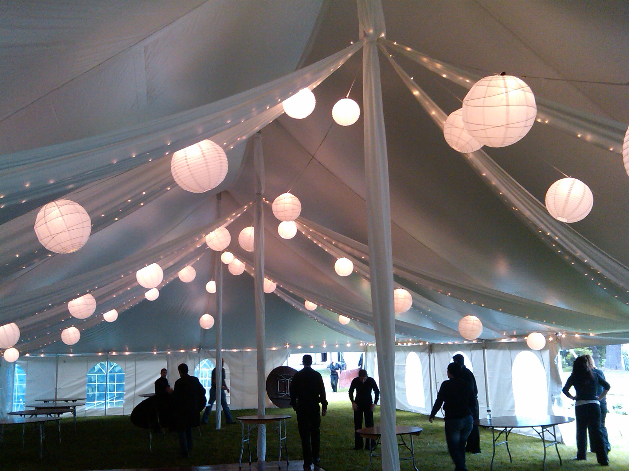 White Paper Lanterns with Fabric Swags and Twinkle Lights