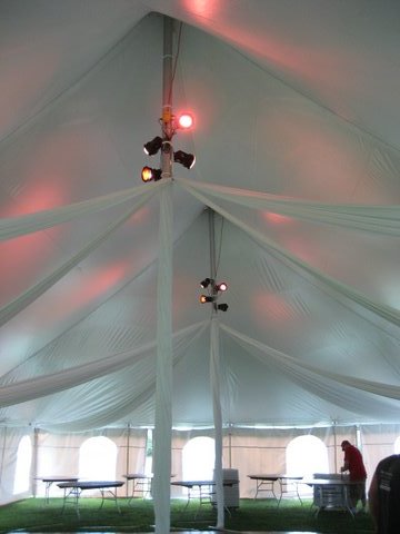 Fabric Swags and Par Can Spot Lights in a Pole Tent