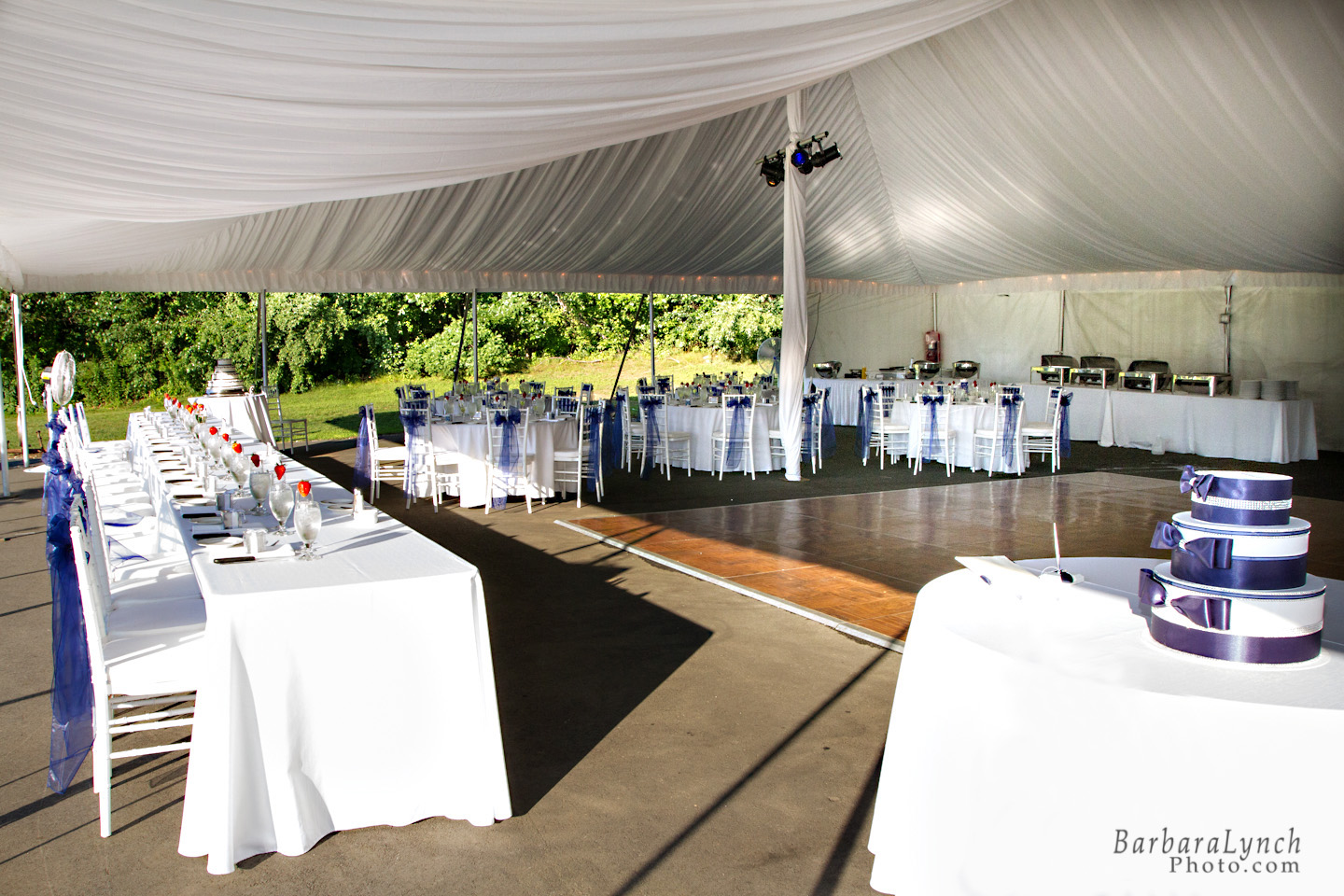 Full Gathered Tent Liner with Par Can Spot Lights and Parquet Dance Floor in a Pole Tent